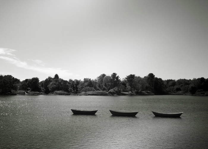 Generating ideas with the rule of three. Three boats on a lake.